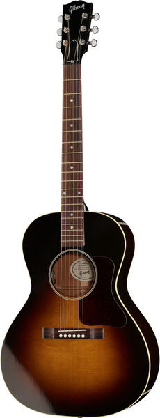 Une guitare folk avec une finition « sunburst » présentant un dégradé allant du marron foncé à l'ambre, un corps arrondi, six cordes et le logo Gibson sur la tête.